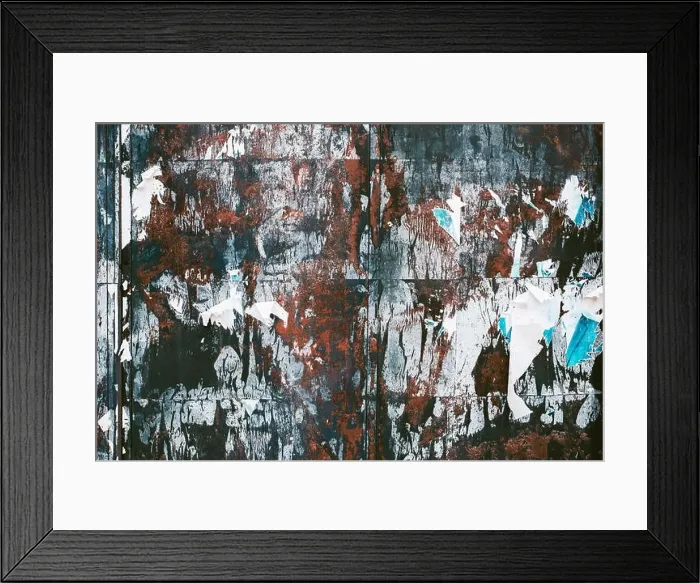 Framed Print : Grunge texture of torn poster paper scraps on the wall Framed Print : Grunge texture of torn poster paper scraps on the wall