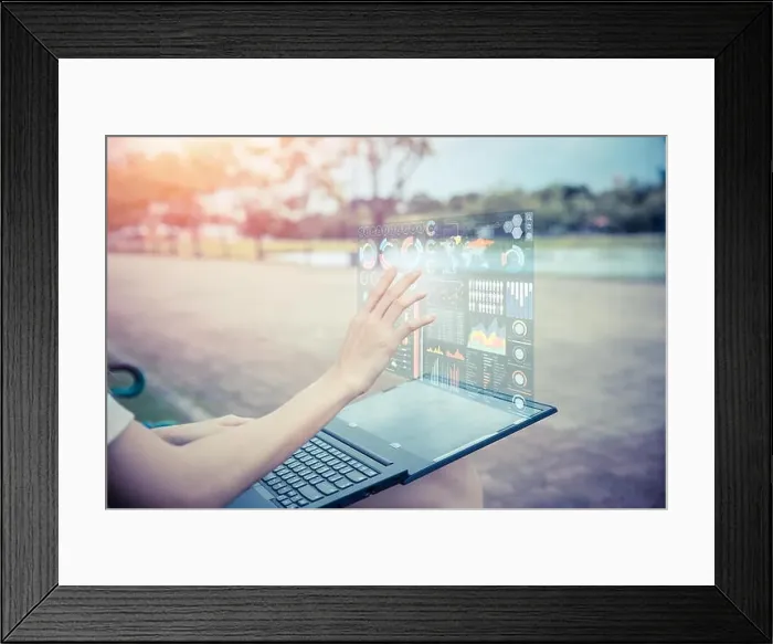 Framed Print : Businesswoman hand using advance technology computer hologram air screen display projection business information data Framed Print : Businesswoman hand using advance technology computer hologram air screen display projection business information data