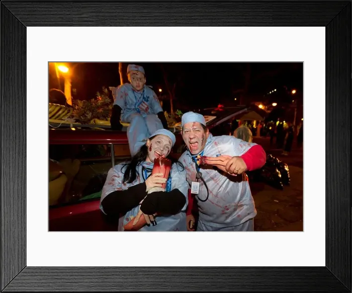Framed Print : A family dressed as ghoulish doctors in the 2010 Greenwich Village Halloween parade in New York City Framed Print : A family dressed as ghoulish doctors in the 2010 Greenwich Village Halloween parade in New York City