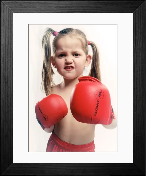 Framed Print : portrait of a little girl boxing gloves Framed Print : portrait of a little girl boxing gloves