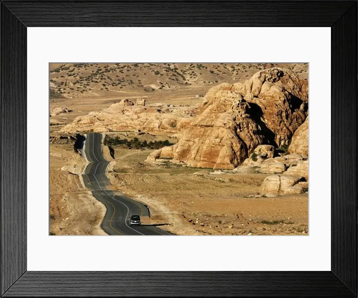 Framed Print : JOR, Jordan, Petra: Country road from the Desert Highway to the city of Wadi Musa Framed Print : JOR, Jordan, Petra: Country road from the Desert Highway to the city of Wadi Musa
