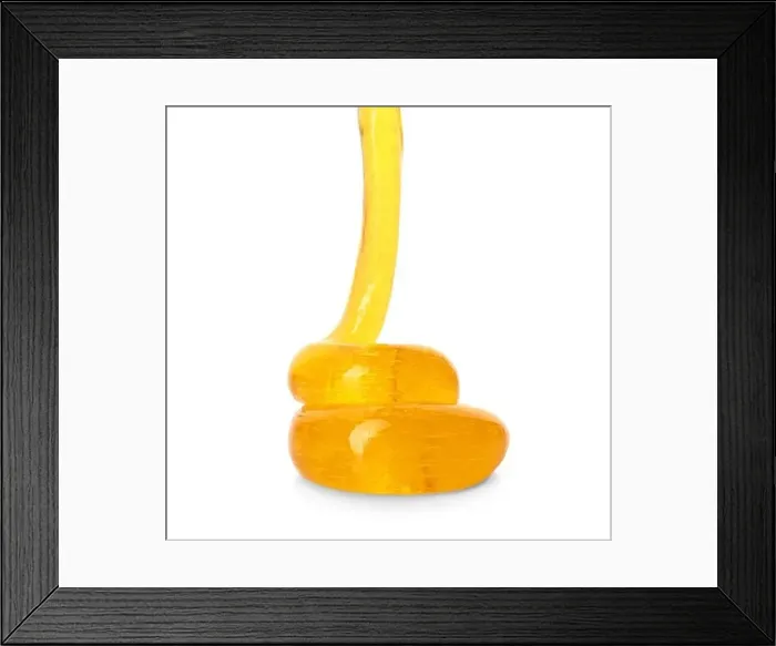 Framed Print : Flowing orange slime on white background. Antistress toy Framed Print : Flowing orange slime on white background. Antistress toy