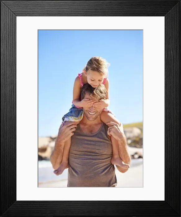 Framed Print : No peeking. A cute little girl covering her fathers eyes while hes giving her a piggyback ride at the beach Framed Print : No peeking. A cute little girl covering her fathers eyes while hes giving her a piggyback ride at the beach