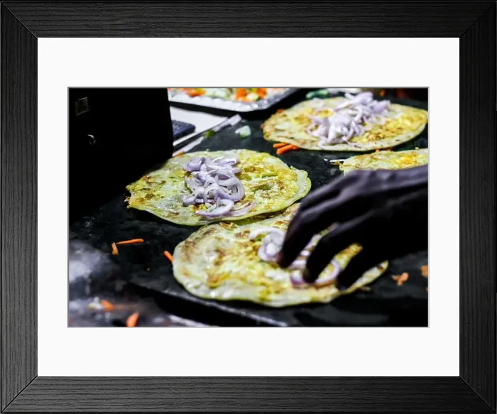 Framed Print : making of egg roll on a hot frying pan with oil and paratha and salad Framed Print : making of egg roll on a hot frying pan with oil and paratha and salad