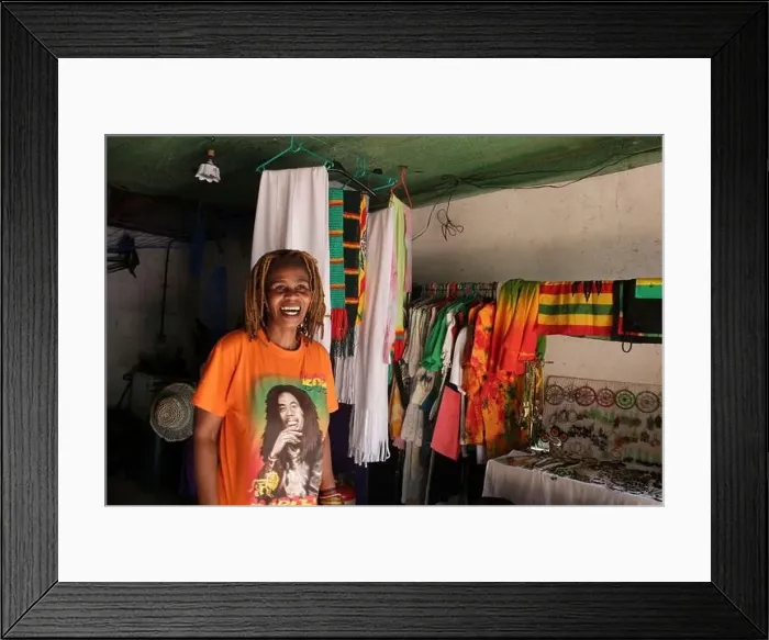 Framed Print : Thelma Boettrich stands in her shop in which she sells products made with homegrown bamboo and natural dyes. Zimbabwe Framed Print : Thelma Boettrich stands in her shop in which she sells products made with homegrown bamboo and natural dyes. Zimbabwe