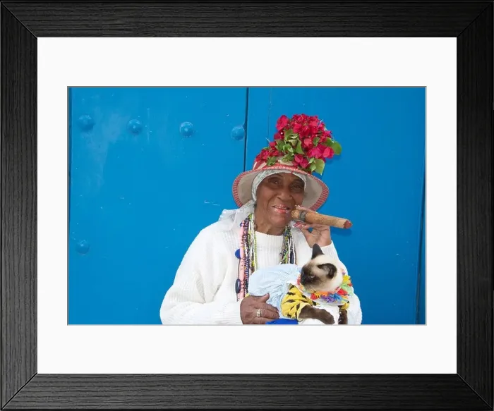 Framed Print : Old woman posing for photos with cigar and cat Old Havana Cuba Framed Print : Old woman posing for photos with cigar and cat Old Havana Cuba