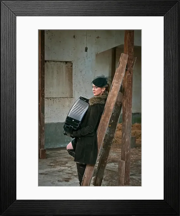 Framed Print : A woman playing an Accordian Framed Print : A woman playing an Accordian