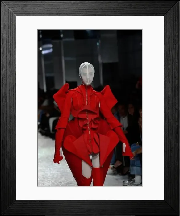 Framed Print : A model walks the runway during the Fashion show by designer Tiago Bessa (Portugal) Framed Print : A model walks the runway during the Fashion show by designer Tiago Bessa (Portugal)