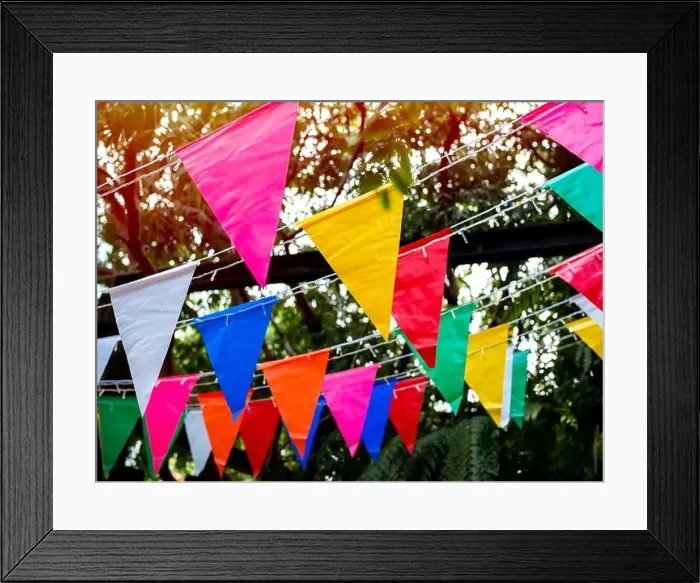 Framed Print : Colorful festival flags hanging in the garden. Beautiful colour of party triangle flags decoration on tree background Framed Print : Colorful festival flags hanging in the garden. Beautiful colour of party triangle flags decoration on tree background