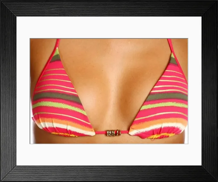 Framed Print : sexy boobs in the colorful bikini Framed Print : sexy boobs in the colorful bikini