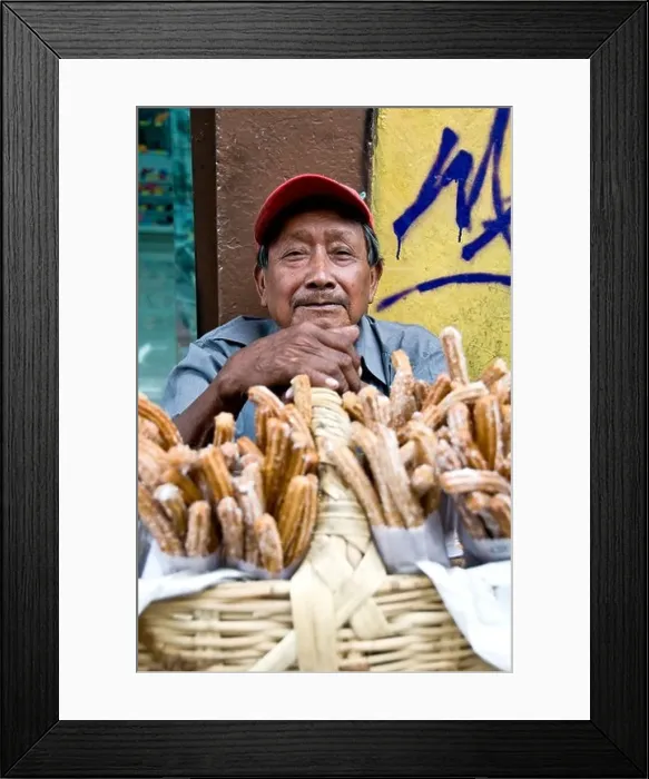 Framed Print : Man selling CHURROS on a street corner in Puebla Framed Print : Man selling CHURROS on a street corner in Puebla