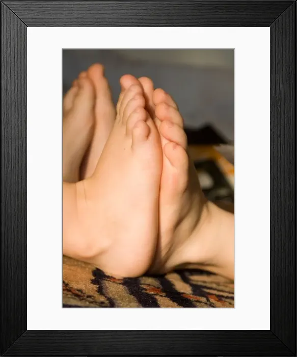 Framed Print : Children's feet pressed up against each other Framed Print : Children's feet pressed up against each other