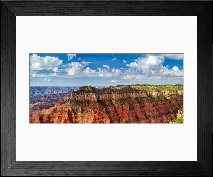 Framed Print : Panoramic view of the North Rim of the Grand Canyon looking across the canyons to a tall mountain plateau under a Framed Print : Panoramic view of the North Rim of the Grand Canyon looking across the canyons to a tall mountain plateau under a