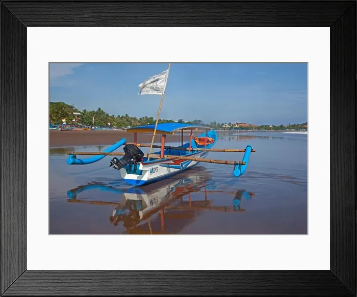 Framed Print : Indonesian jukung, traditional wooden outrigger canoe on beach at Pangandaran along the Indian Ocean Framed Print : Indonesian jukung, traditional wooden outrigger canoe on beach at Pangandaran along the Indian Ocean