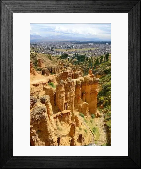 Framed Print : Bizarre rock towers Torre Torre with city Huancayo in the background, region Junin, Peru Framed Print : Bizarre rock towers Torre Torre with city Huancayo in the background, region Junin, Peru