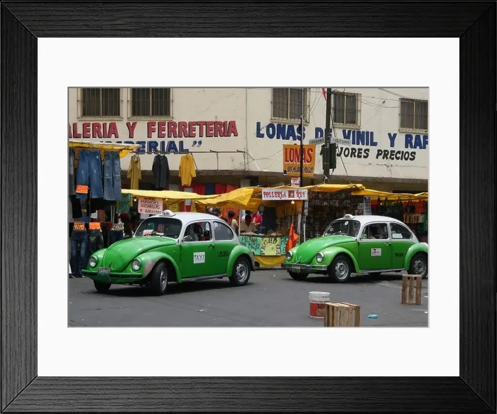 Framed Print : Two green and white beetle taxis driving through a market in Mexico City, Mexico, South America Framed Print : Two green and white beetle taxis driving through a market in Mexico City, Mexico, South America