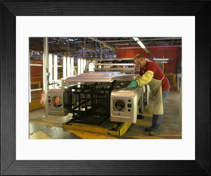 Framed Print : Land Rover Defender body gets final quality inspection before going for painting Framed Print : Land Rover Defender body gets final quality inspection before going for painting