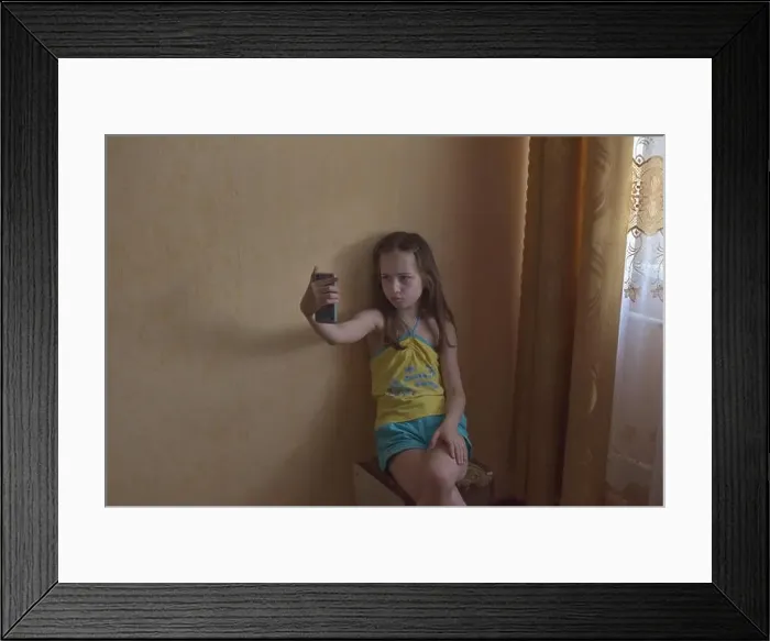 Framed Print : Selfie star. Small girl take selfie with smartphone Framed Print : Selfie star. Small girl take selfie with smartphone