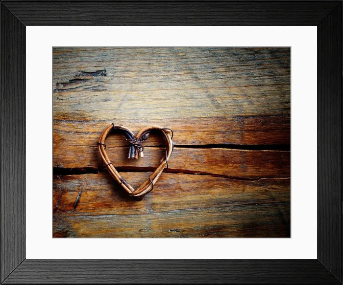 Framed Print : Wooden background with willow heart, selective focus Framed Print : Wooden background with willow heart, selective focus