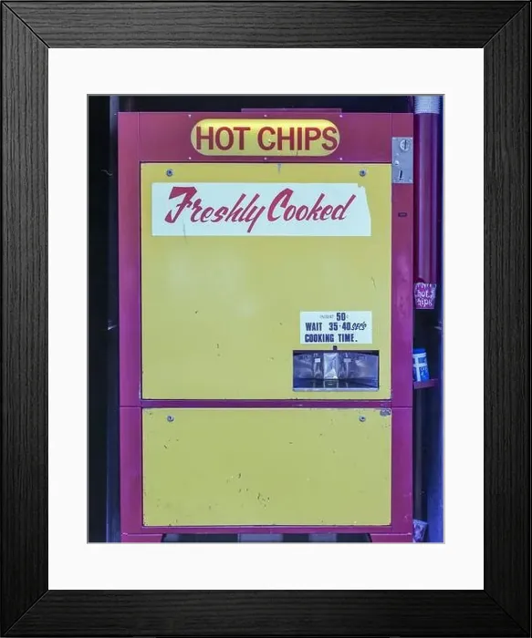 Framed Print : A 1981 historic image of a Hot Chip vending machine in Christchurch on the south island of New Zealand