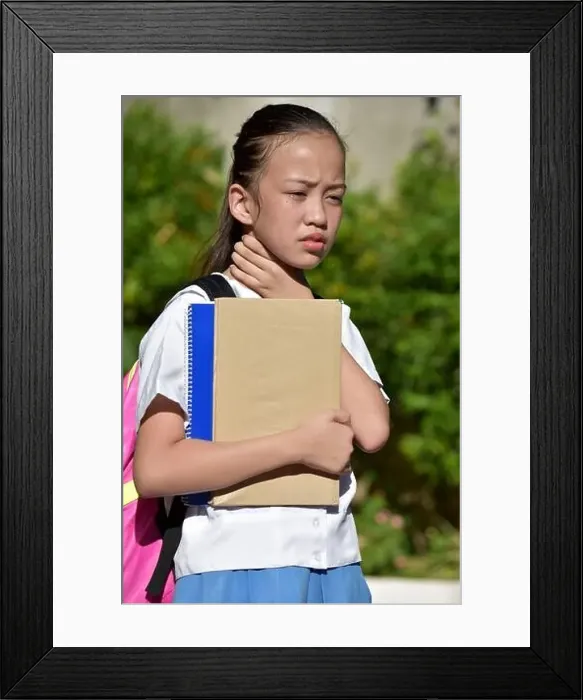 Framed Print : Filipina Girl Student With Sore Throat Framed Print : Filipina Girl Student With Sore Throat