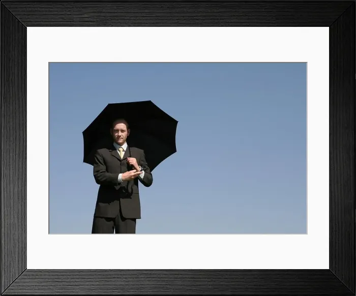 Framed Print : Man with a umbrella - Geschäftsmann mit Regenschirm Framed Print : Man with a umbrella - Geschäftsmann mit Regenschirm