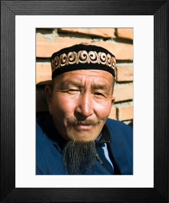 Framed Print : Portrait of a Kazakh man wearing a traditional Kazakh hat Framed Print : Portrait of a Kazakh man wearing a traditional Kazakh hat