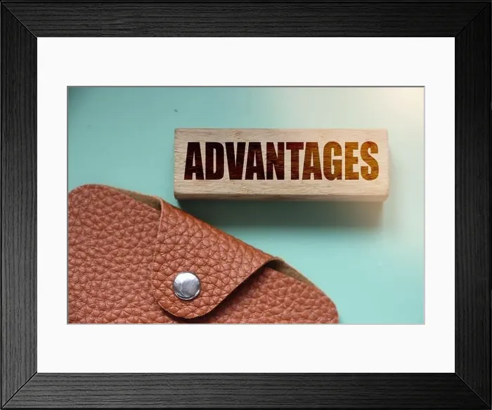 Framed Print : Advantages on a wooden blockand brown leather wallet. Business concept