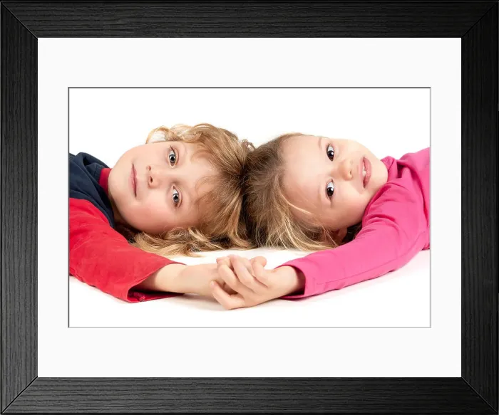 Framed Print : Lovely young children's couple isolated in white Framed Print : Lovely young children's couple isolated in white