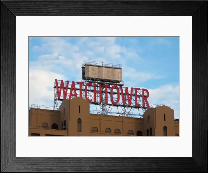 Framed Print : Facade with sign of The Watchtower building in the Dumbo area of Brooklyn, NY, USA on September 8, 2013 Framed Print : Facade with sign of The Watchtower building in the Dumbo area of Brooklyn, NY, USA on September 8, 2013