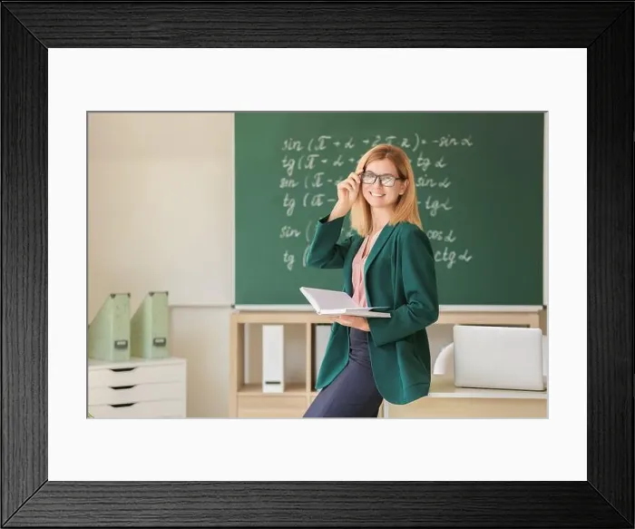 Framed Print : Beautiful female teacher in classroom Framed Print : Beautiful female teacher in classroom