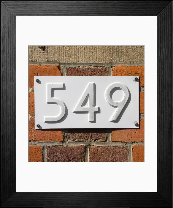 Framed Print : New white house number five hundred and forty-nine, embossed in a metal plate Framed Print : New white house number five hundred and forty-nine, embossed in a metal plate