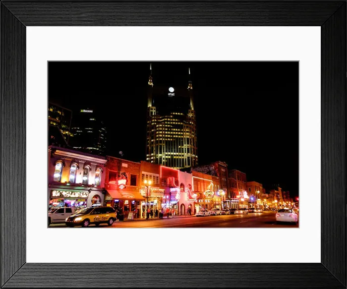 Framed Print : Neon signs illuminate Broadway Street at night in Downtown Nashville, Tennessee Framed Print : Neon signs illuminate Broadway Street at night in Downtown Nashville, Tennessee