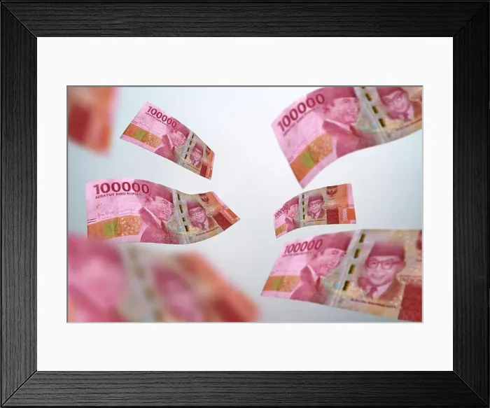 Framed Print : One hundred thousand rupiah banknote flying on a white background. Uang kertas seratus ribu Framed Print : One hundred thousand rupiah banknote flying on a white background. Uang kertas seratus ribu
