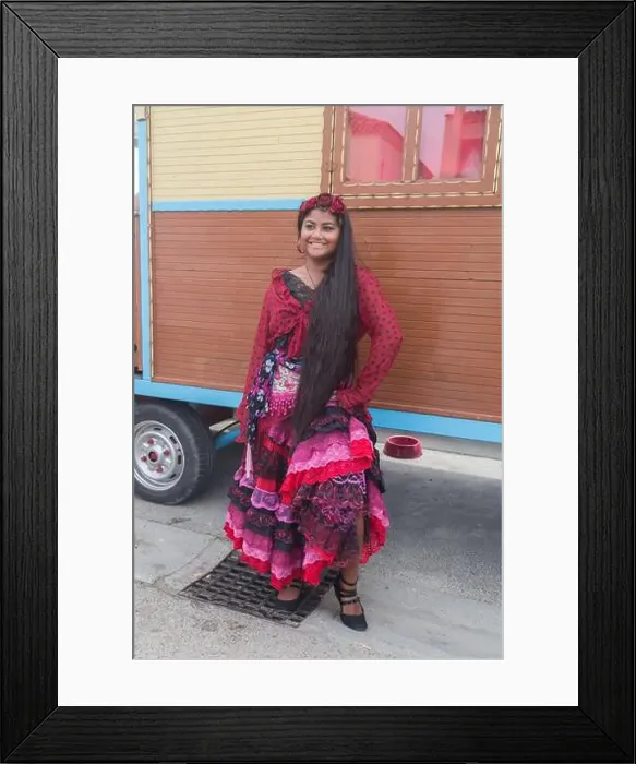 Framed Print : Pilgrim outside a traditional gypsy caravan after the annual Roma procession with the Saint Sarah statue to the sea Framed Print : Pilgrim outside a traditional gypsy caravan after the annual Roma procession with the Saint Sarah statue to the sea
