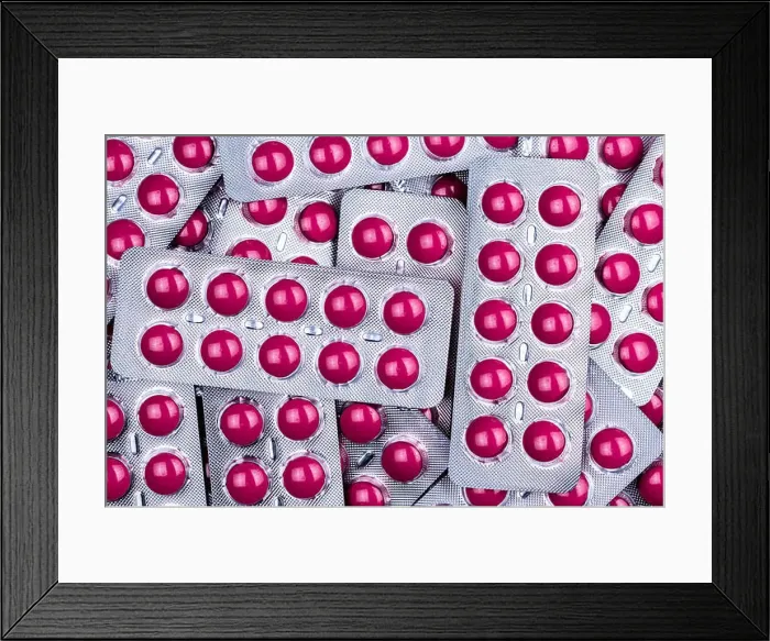 Framed Print : Pink tablets pill in blister pack Framed Print : Pink tablets pill in blister pack