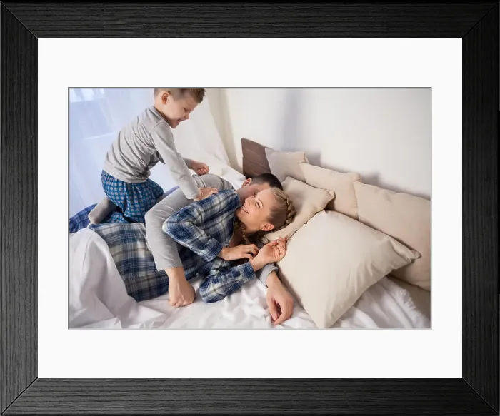 Framed Print : mom dad and young son in the bedroom after sleeping House Framed Print : mom dad and young son in the bedroom after sleeping House