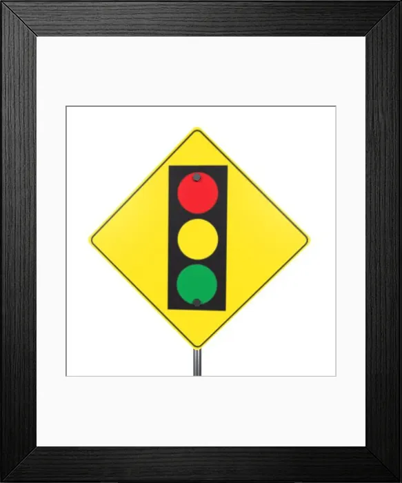Framed Print : A caution sign featuring a traffic light symbol with red, yellow, and green circles Framed Print : A caution sign featuring a traffic light symbol with red, yellow, and green circles