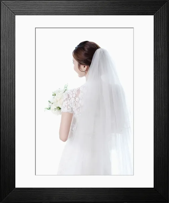 Framed Print : back shot of a woman in wedding dress holding flower bouquet Framed Print : back shot of a woman in wedding dress holding flower bouquet