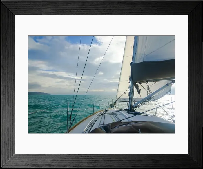 Framed Print : A sailing yacht on the south coast of the UK, with sea and gentle waves Framed Print : A sailing yacht on the south coast of the UK, with sea and gentle waves