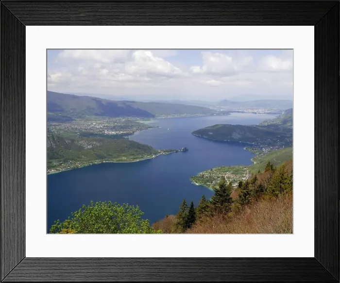 Framed Print : famous view of Annecy lake above col de Forclaz in Haute Savoie, scenic alpine lake landscape Framed Print : famous view of Annecy lake above col de Forclaz in Haute Savoie, scenic alpine lake landscape
