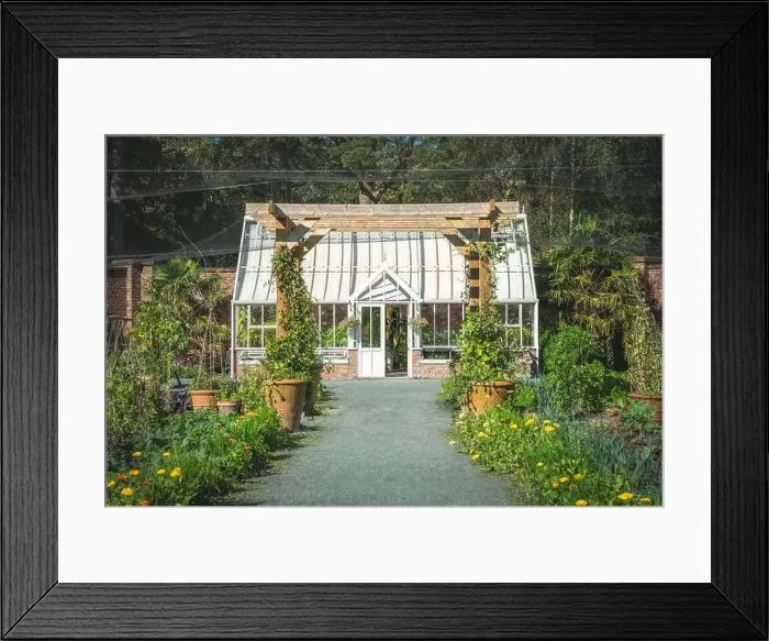Framed Print : A beautiful formal walled garden with Victorian style greenhouse and vegetable patch in an English country garden Framed Print : A beautiful formal walled garden with Victorian style greenhouse and vegetable patch in an English country garden