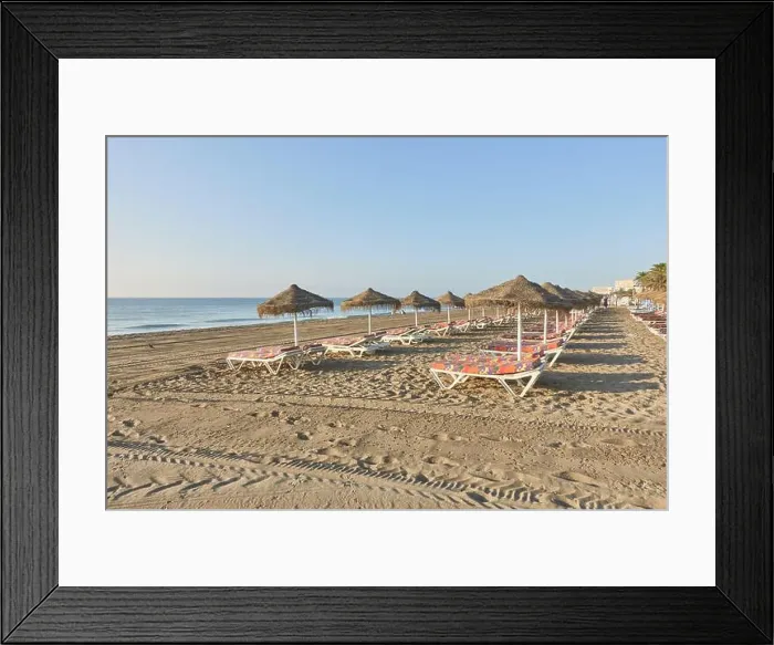 Framed Print : Umbrellas and hammocks on the beachfront of Los Alamos sandy beach in Torremolinos, Malaga, Andalusia, Spain Framed Print : Umbrellas and hammocks on the beachfront of Los Alamos sandy beach in Torremolinos, Malaga, Andalusia, Spain