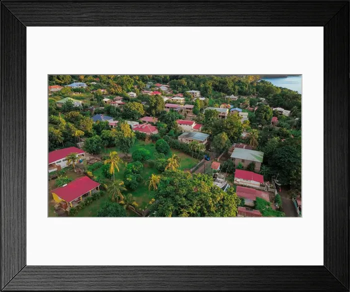 Framed Print : Colorful Houses among the green trees on the Guadalupe hills, Caribbean islands Framed Print : Colorful Houses among the green trees on the Guadalupe hills, Caribbean islands