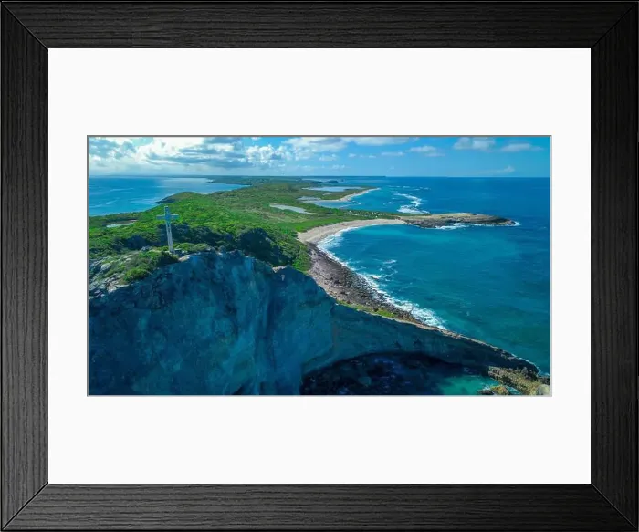 Framed Print : Aerial View to the Green Coast of the Pointe des Chateaux beach under the blue cloudy sky, Guadeloupe island Framed Print : Aerial View to the Green Coast of the Pointe des Chateaux beach under the blue cloudy sky, Guadeloupe island