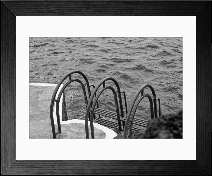 Framed Print : Monochrome of a ladder that leads into the churning ocean waters in Porto Moniz natural pools Framed Print : Monochrome of a ladder that leads into the churning ocean waters in Porto Moniz natural pools