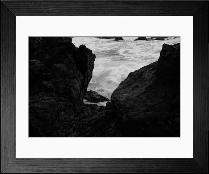 Framed Print : Monochrome glimpse of swirling ocean waters framed by dark volcanic rocks at Porto Moniz natural pools Framed Print : Monochrome glimpse of swirling ocean waters framed by dark volcanic rocks at Porto Moniz natural pools