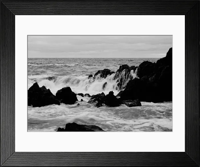 Framed Print : Waves cascade over dark volcanic rocks in a mesmerizing flow at Porto Moniz natural pools Framed Print : Waves cascade over dark volcanic rocks in a mesmerizing flow at Porto Moniz natural pools