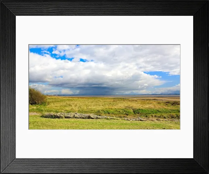 Framed Print : View over the Solway Firth shoreline from Scotland towards Cumbria with storm clouds gathering Framed Print : View over the Solway Firth shoreline from Scotland towards Cumbria with storm clouds gathering
