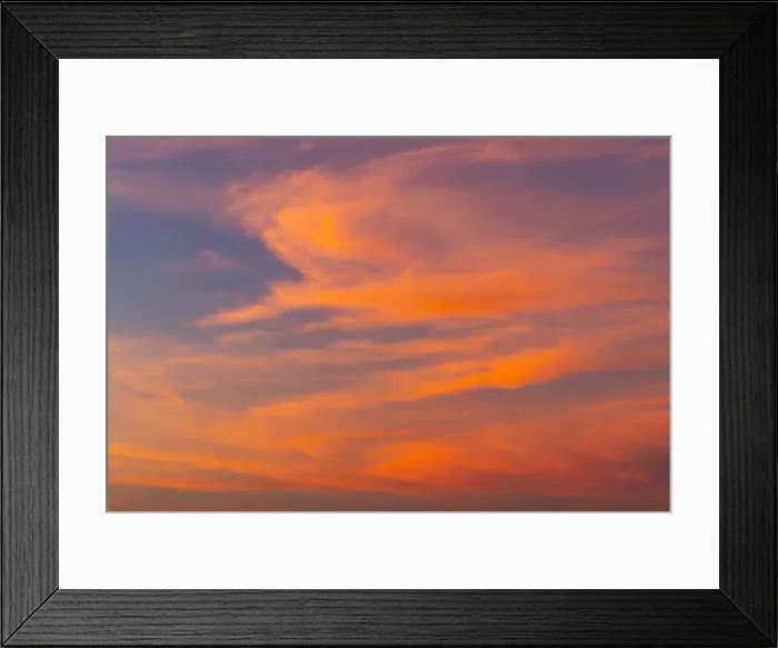 Framed Print : The setting sun lighting up the cloud cover over the Severn Estuary
